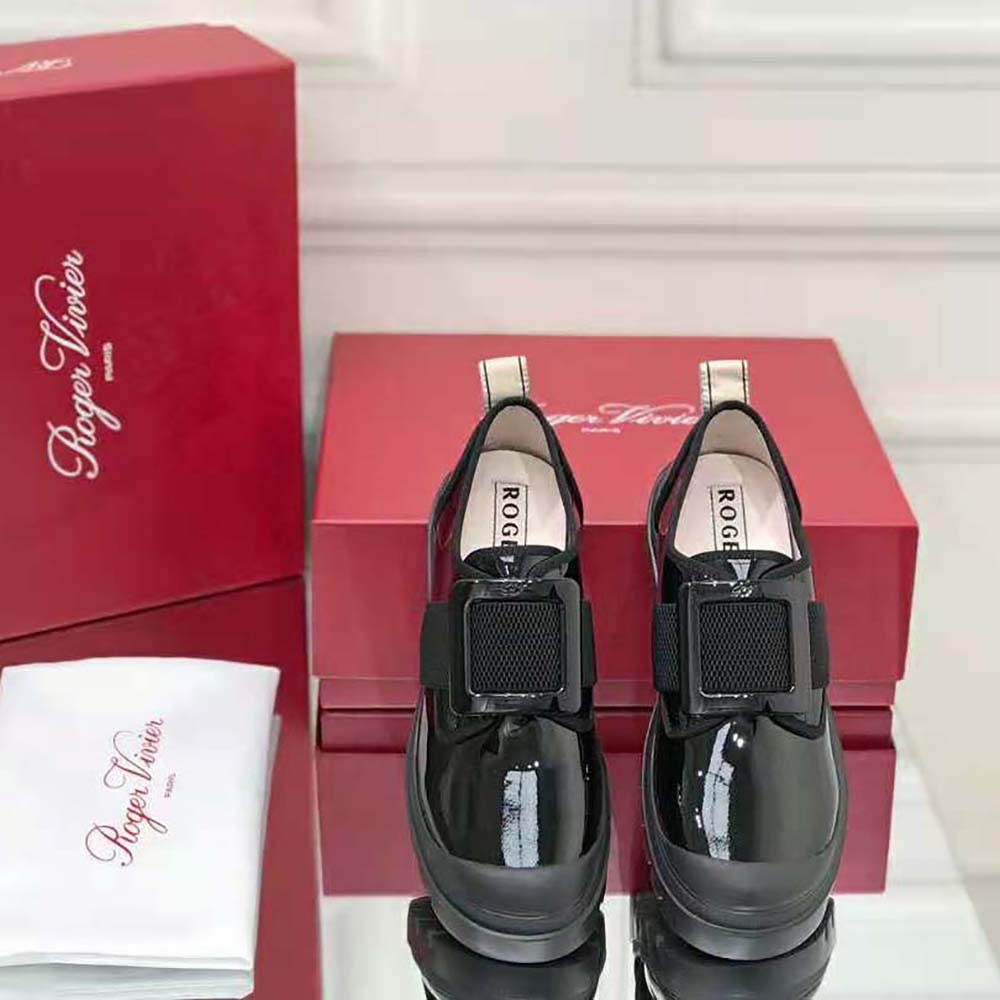 Side profile showing sleek silhouette of Roger Vivier Walky Viv Lacquered Buckle Sneakers