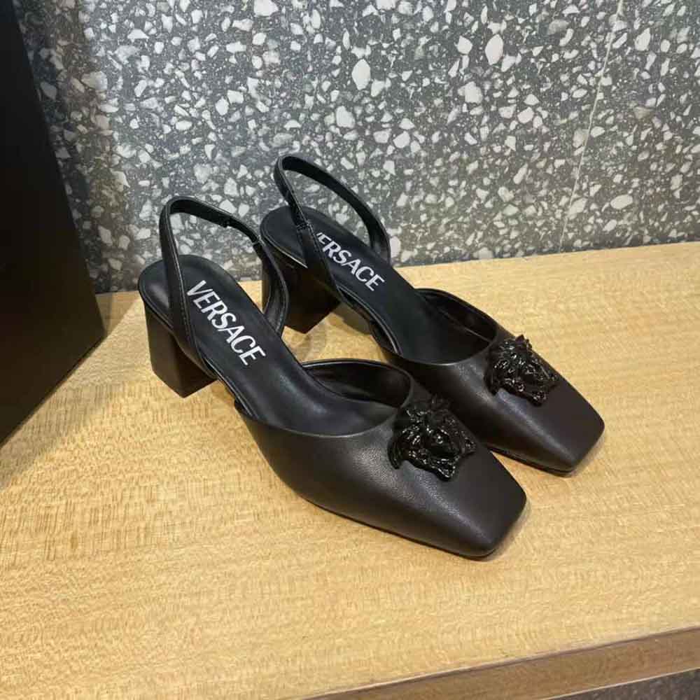 Rear angle showing sling-back strap on Versace Women La Medusa leather pumps black