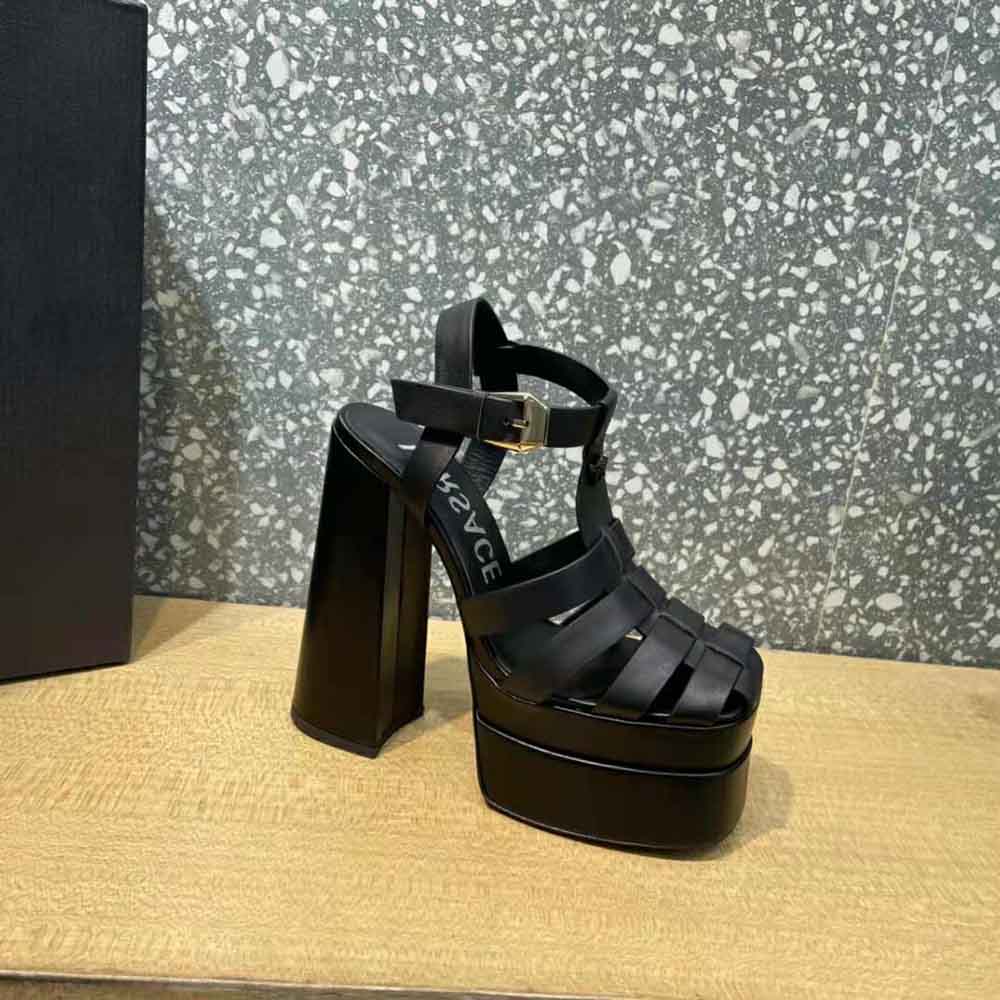 Close-up of gold Medusa emblem on Versace Women La Medusa Platform Sandals