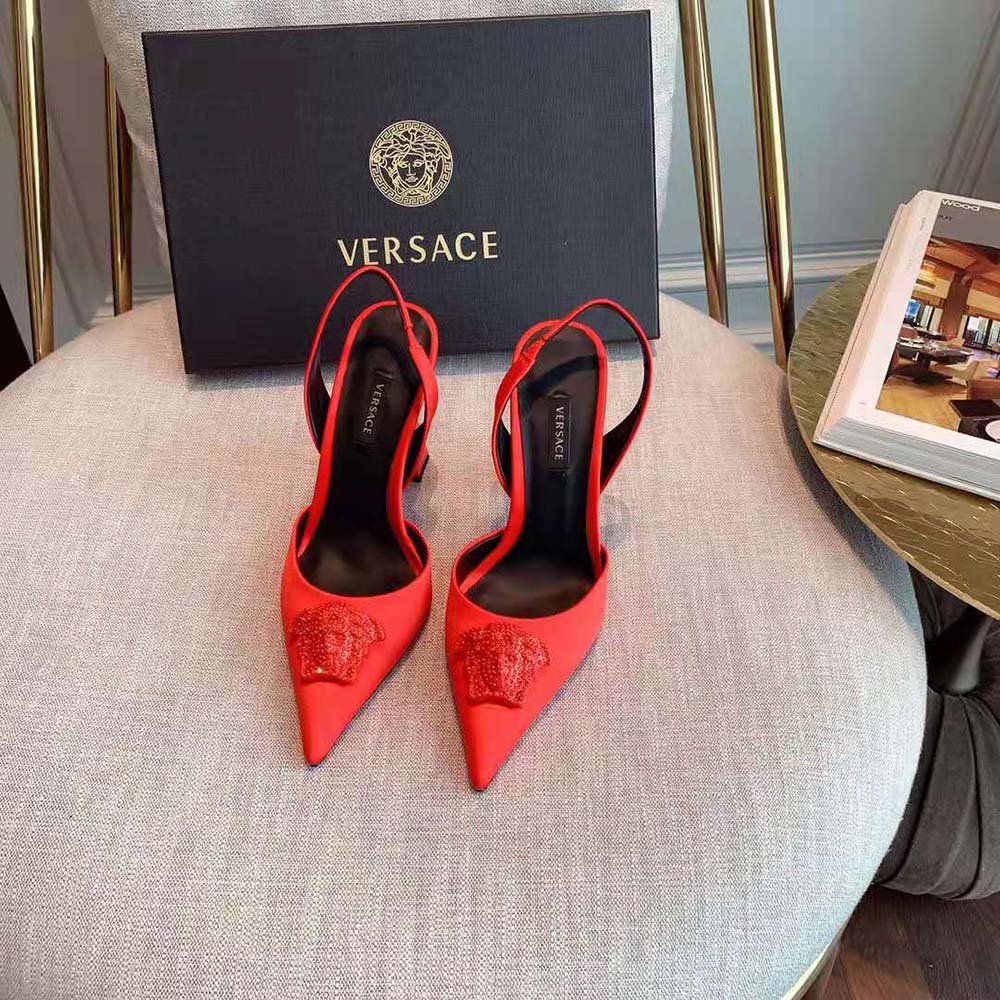 Top view detailing the satin texture of Versace Women La Medusa Satin Sling-Back Pumps