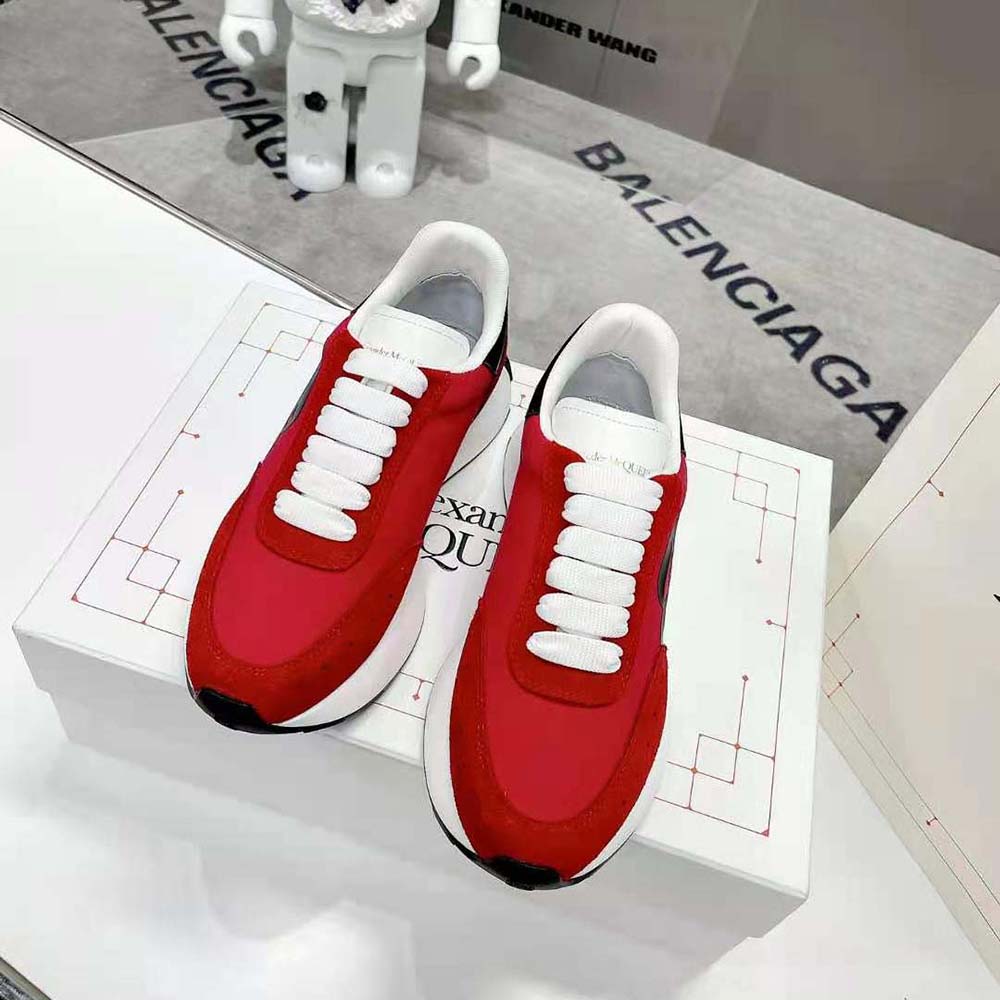 Close-up of sculpted sole and lace detail on Lust Red Alexander Mcqueen sneaker