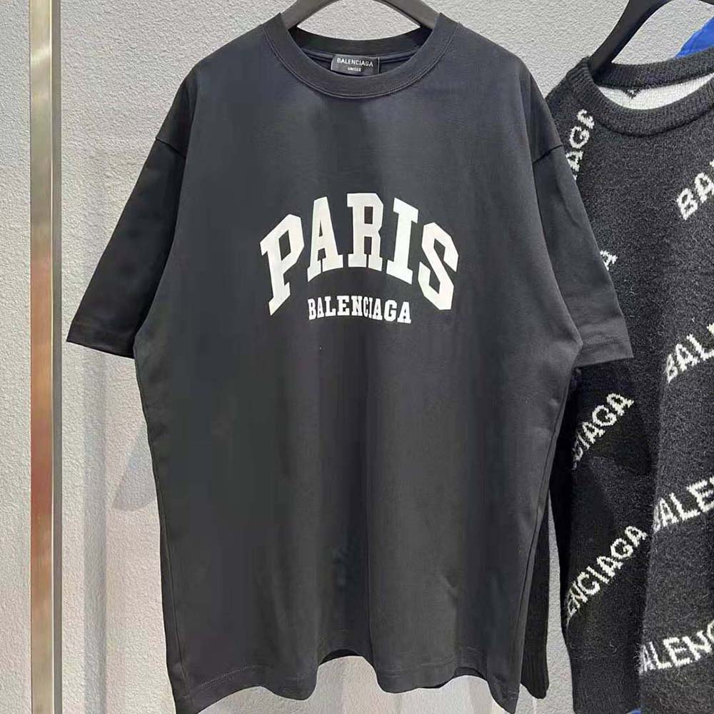 Side angle showing medium fit silhouette of Balenciaga Men Cities Paris T-shirt