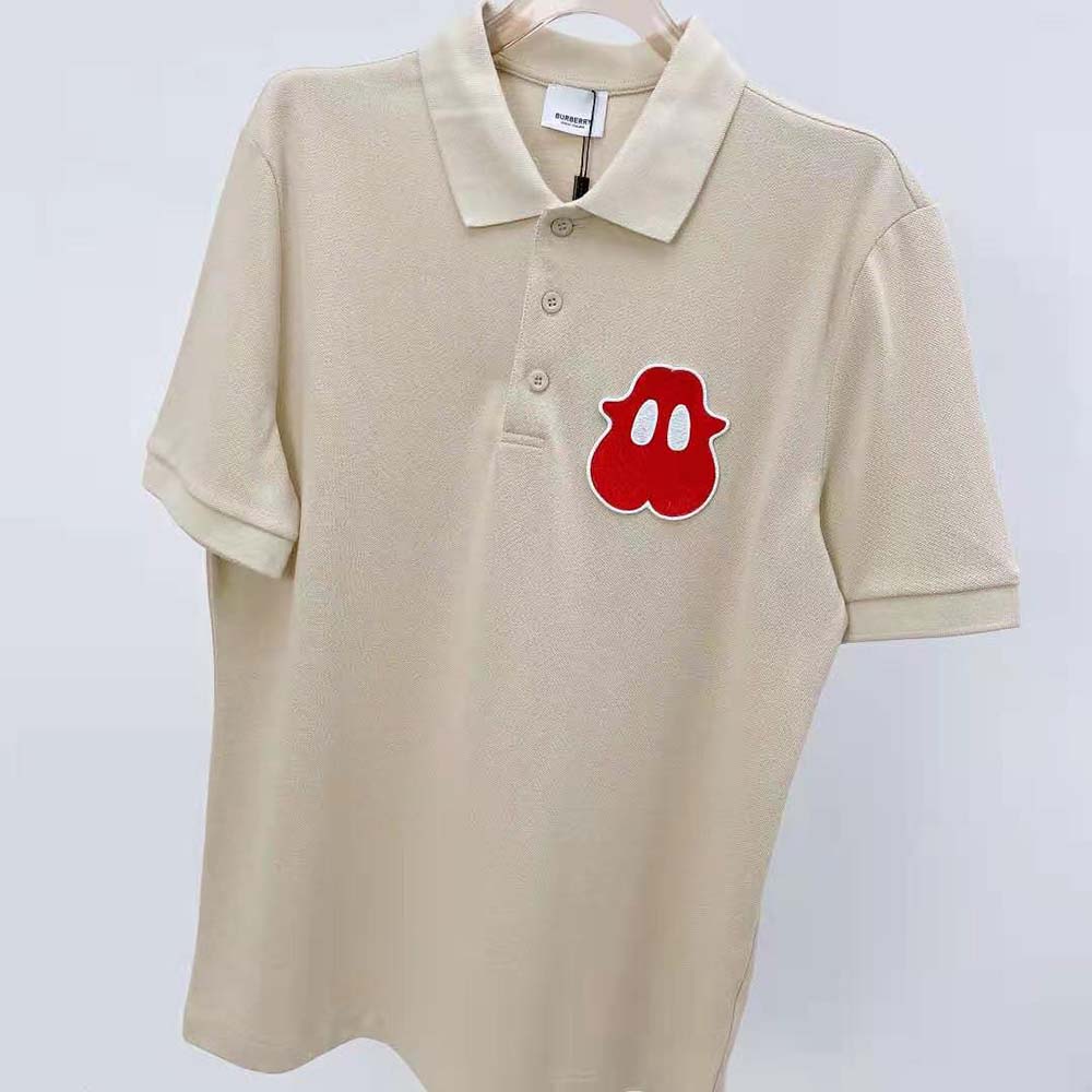 Side profile showing oversized fit of Burberry Men Monster Graphic Polo Shirt