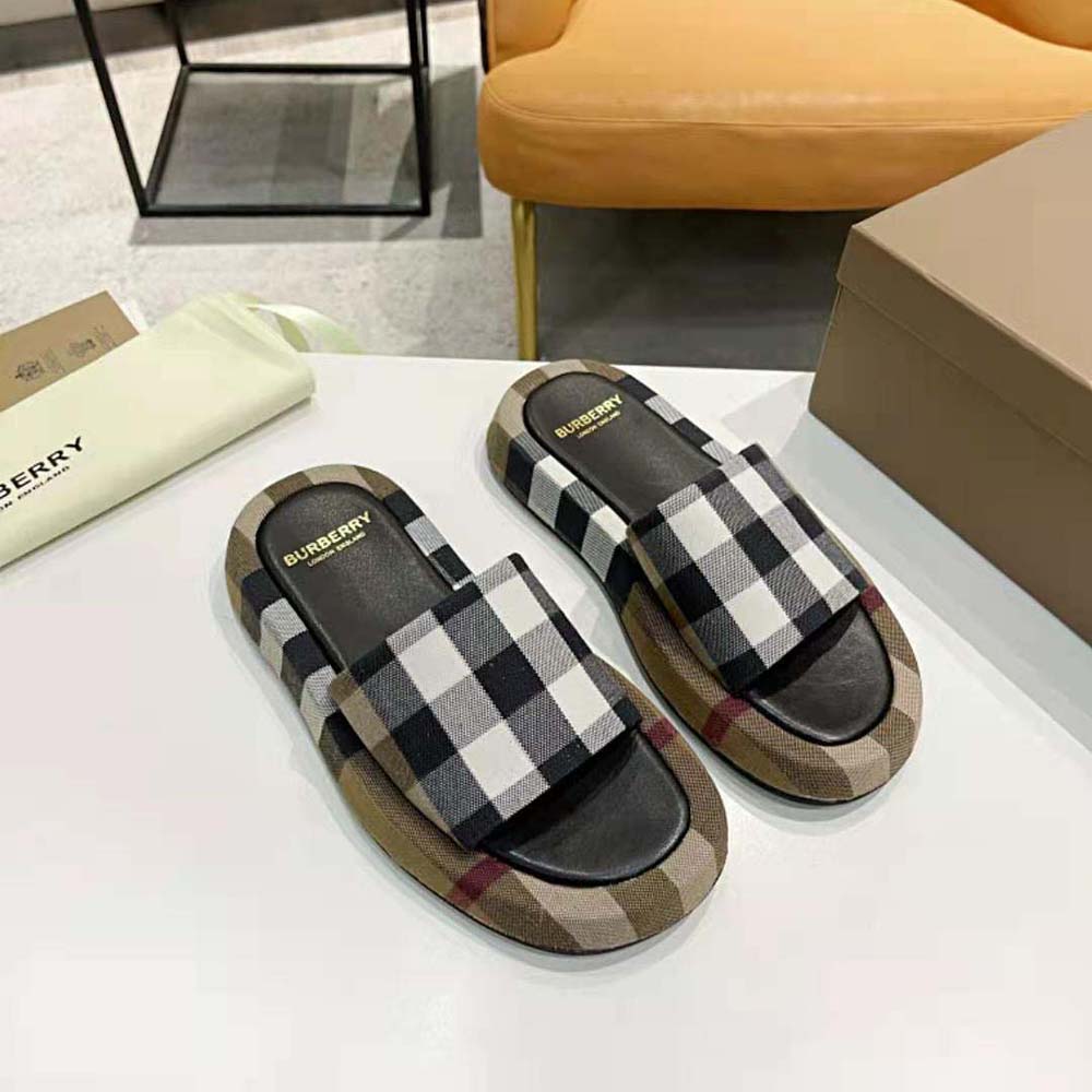 Close-up of brown organic cotton upper with Burberry check detail