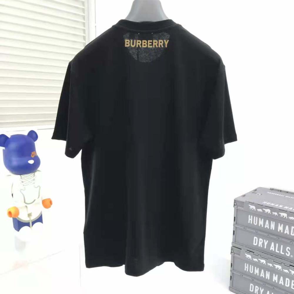 Side angle showing relaxed fit of Burberry Men Deer Graphic Cotton Oversized T-shirt-Black
