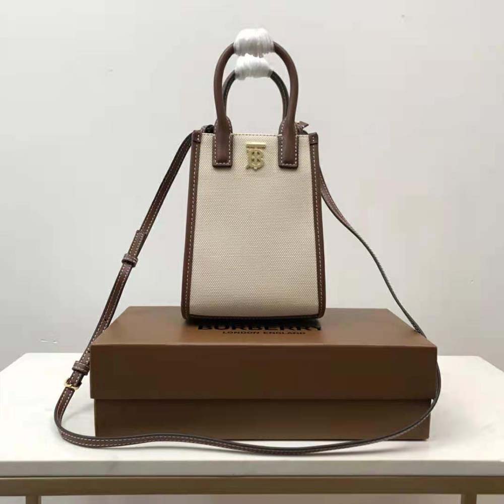 Close-up of gold-tone hardware and micro monogram on Burberry tote