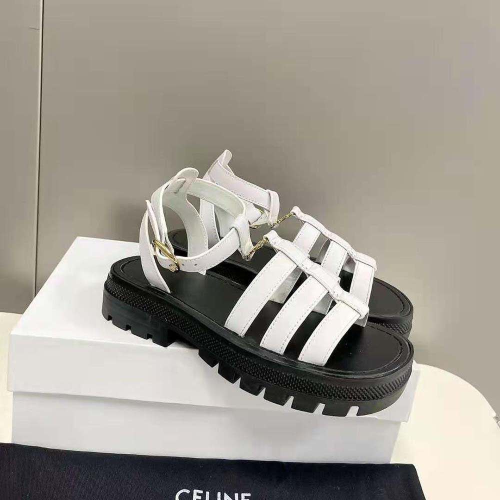 Top angle showing white vegetal calfskin and chunky sole details