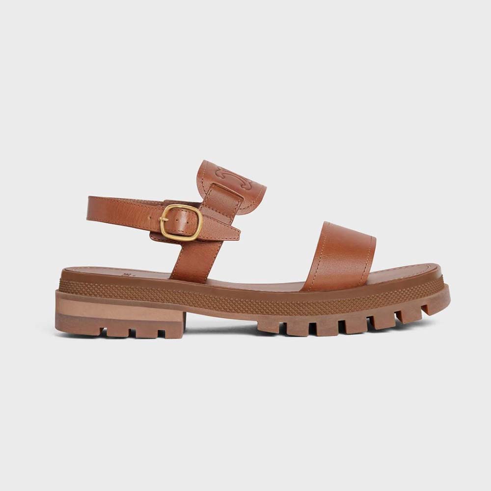 Side view of Celine Women Clea Triomphe Sandal in vegetal calfskin brown
