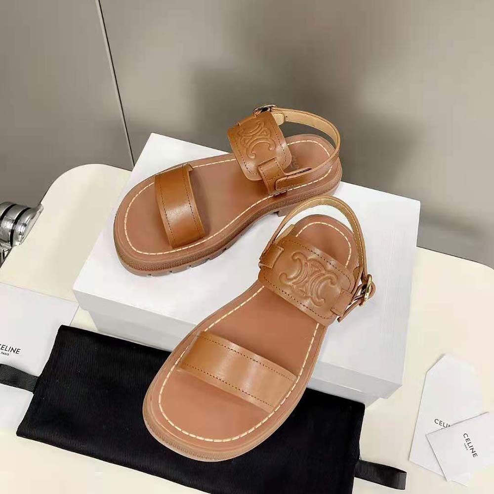 Top-down angle showing open-toe silhouette of Celine Women Clea Triomphe Sandal