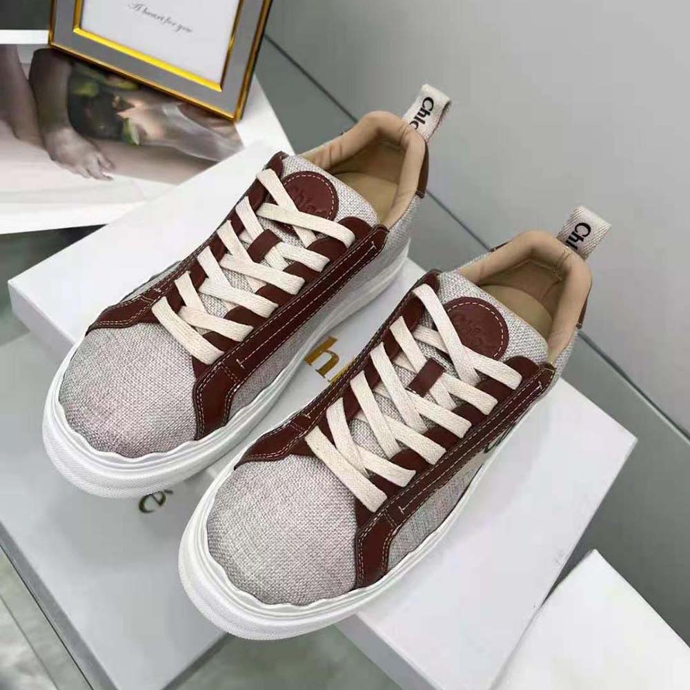 Close-up detail of brown leather and canvas on Chloe Women Lauren Sneaker