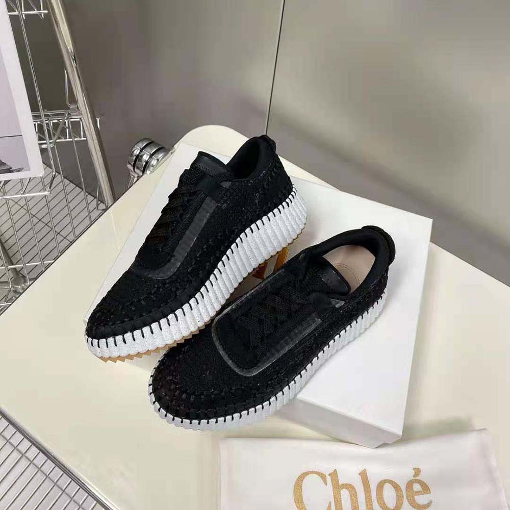 Overhead view showing tonal laces on Chloe Women Nama Sneaker in black