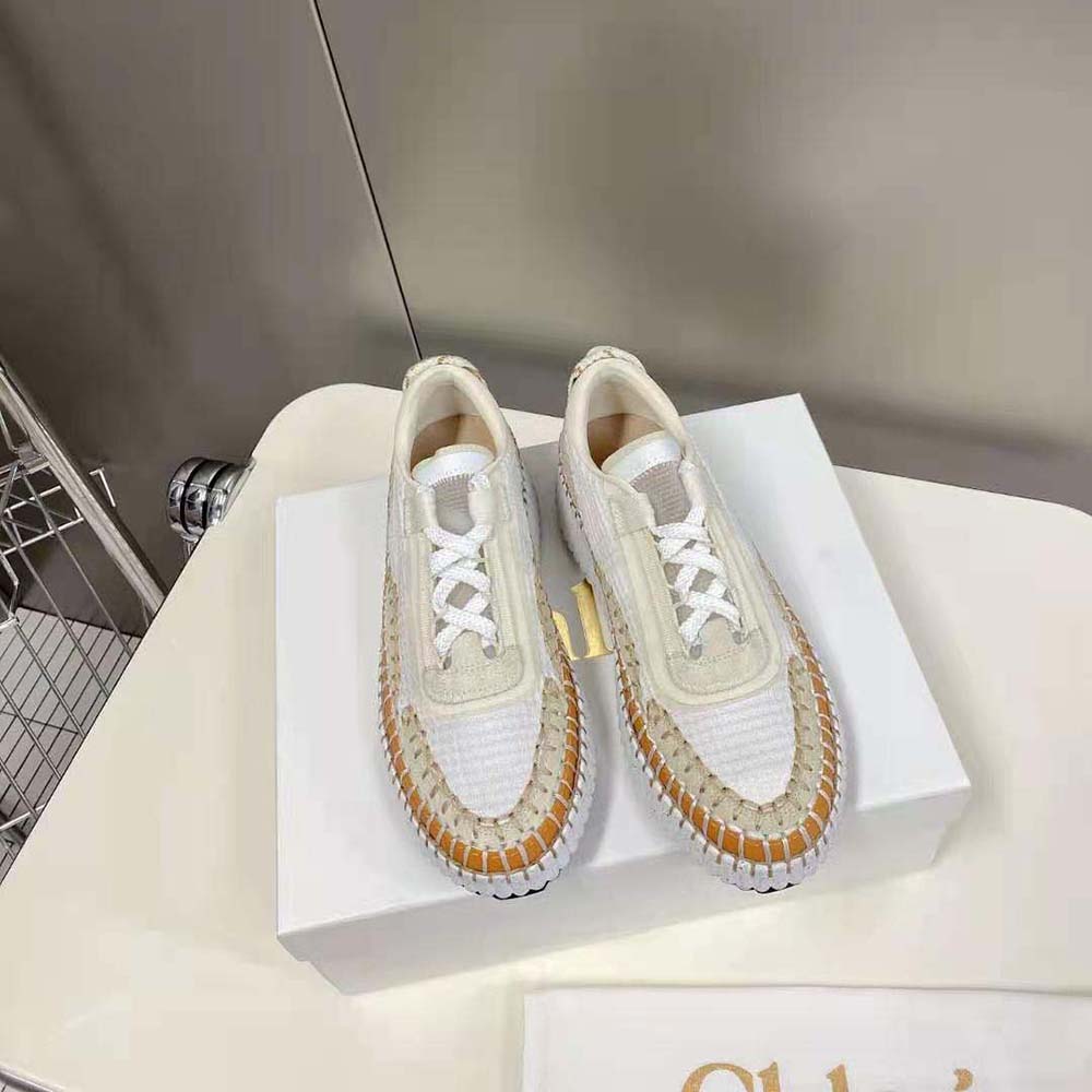 Close-up on white recycled mesh and Chloé branded detail