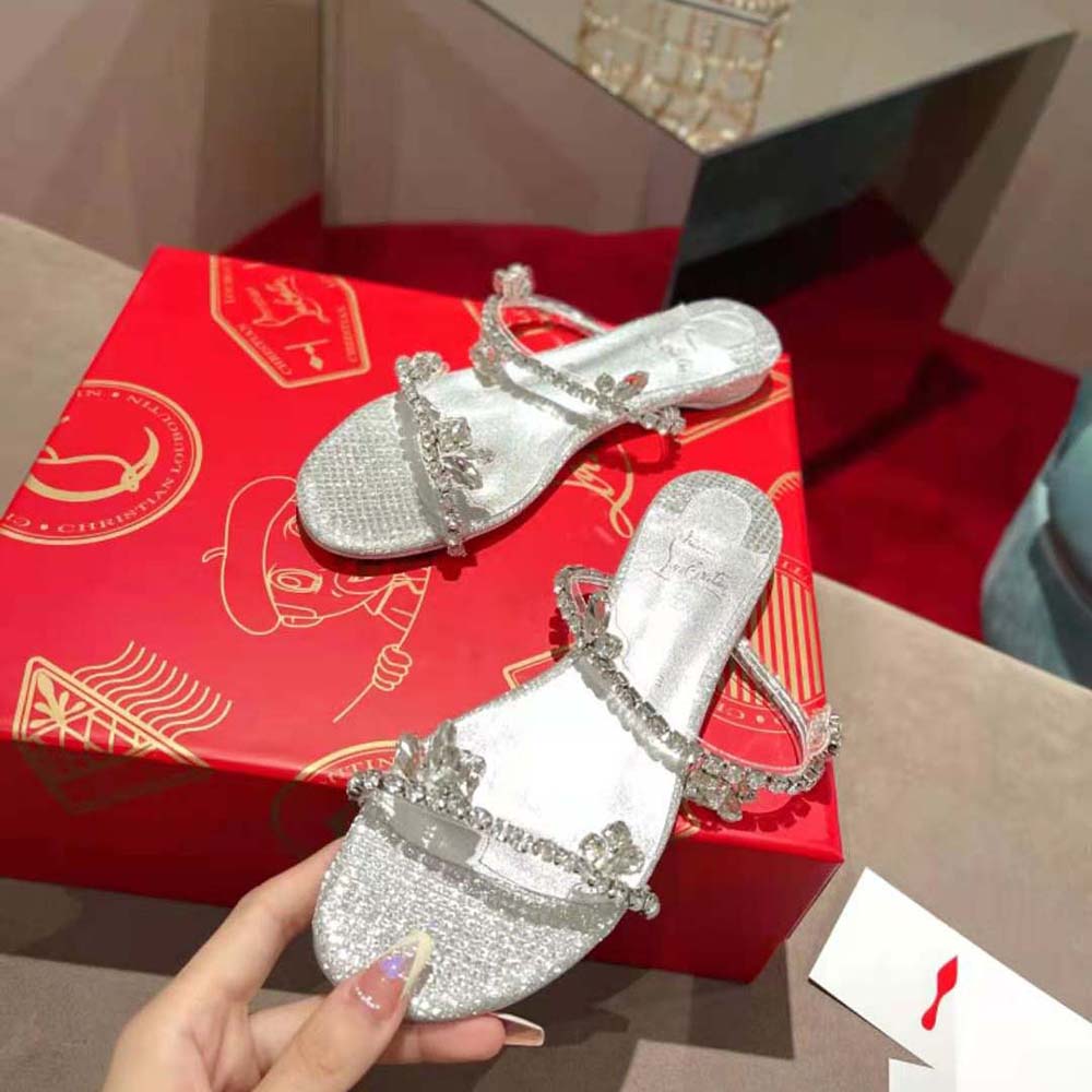 View of signature red sole on Christian Louboutin Women Just Queenie Mule