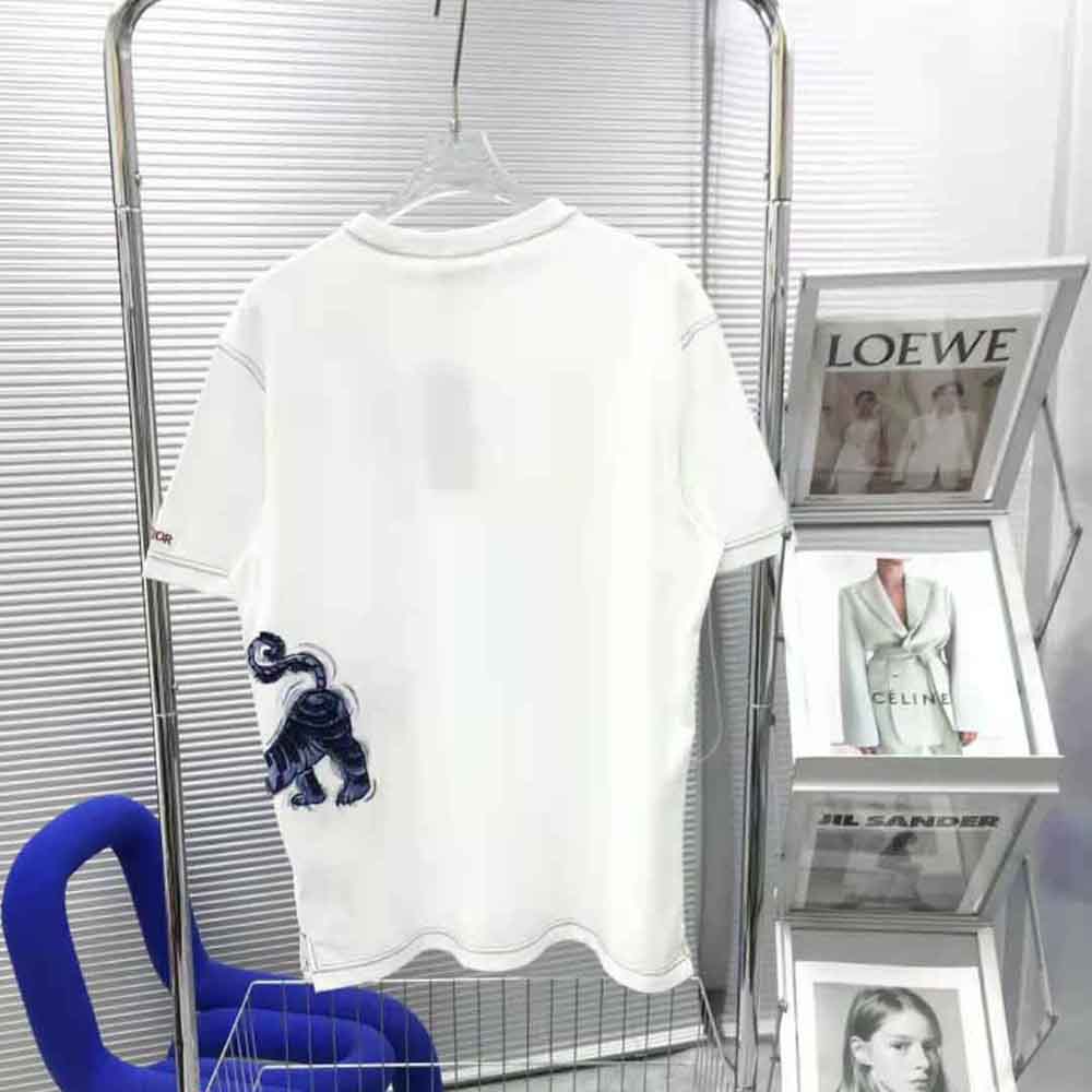 Side angle showing relaxed fit and white cotton texture of Dior Men T-shirt