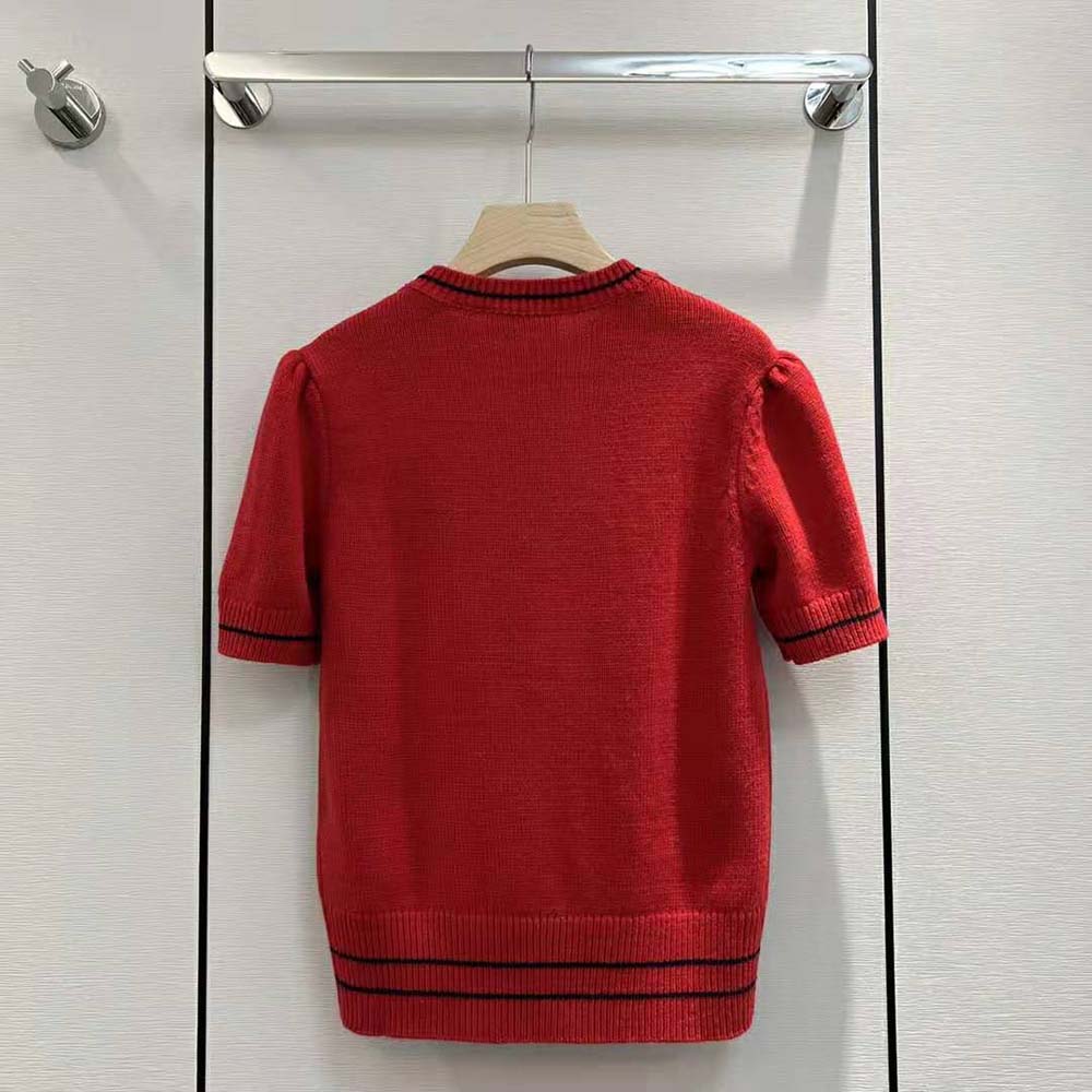 Side angle showing silhouette and fine knit of Dior Women Christian Dior Sweater
