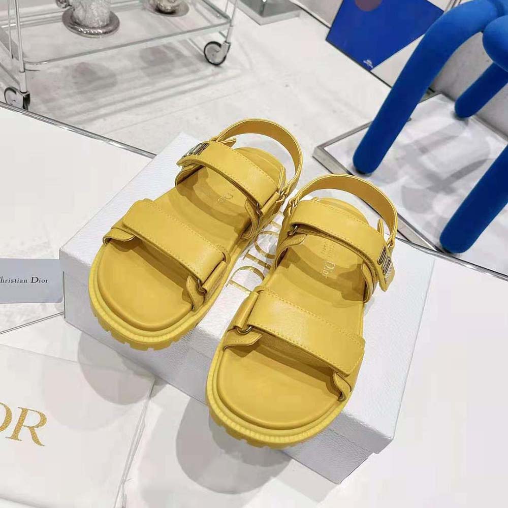 Front angle showing open-toe and lambskin texture in sandal