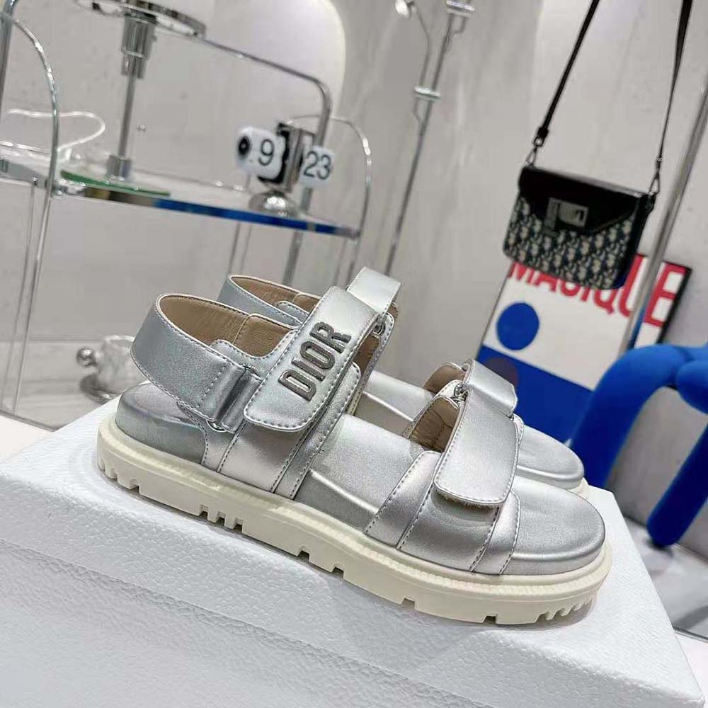 Close-up detail of silver-tone hardware on Dioract Sandal by Dior