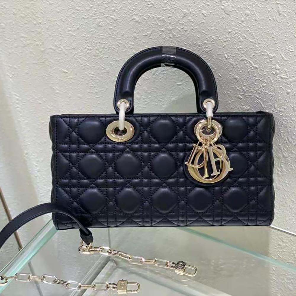 Side angle showing profile and adjustable strap of Dior Women Lady D-Joy Bag