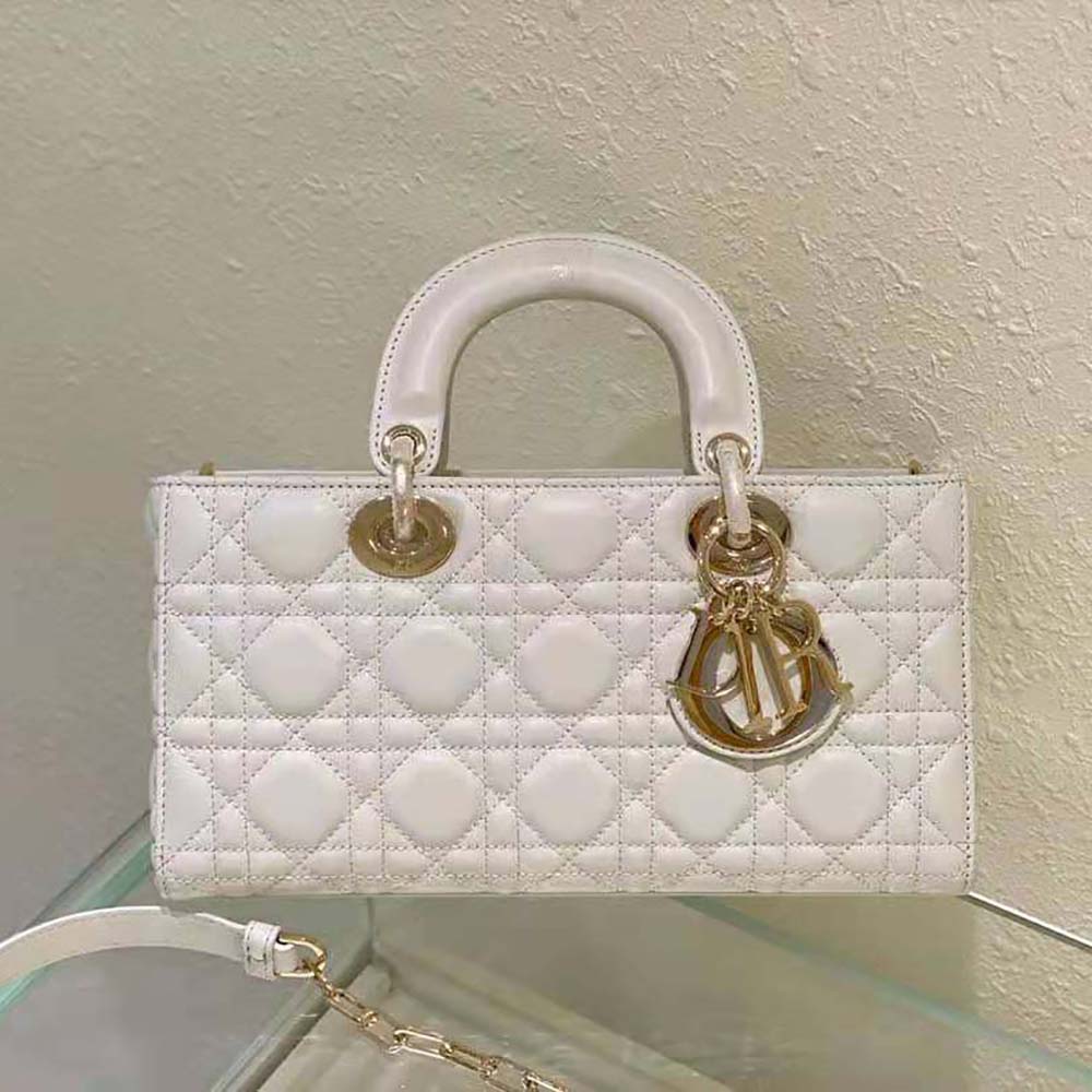 Side angle showcasing the silhouette of Dior Women Lady D-Joy Bag Latte Cannage Lambskin
