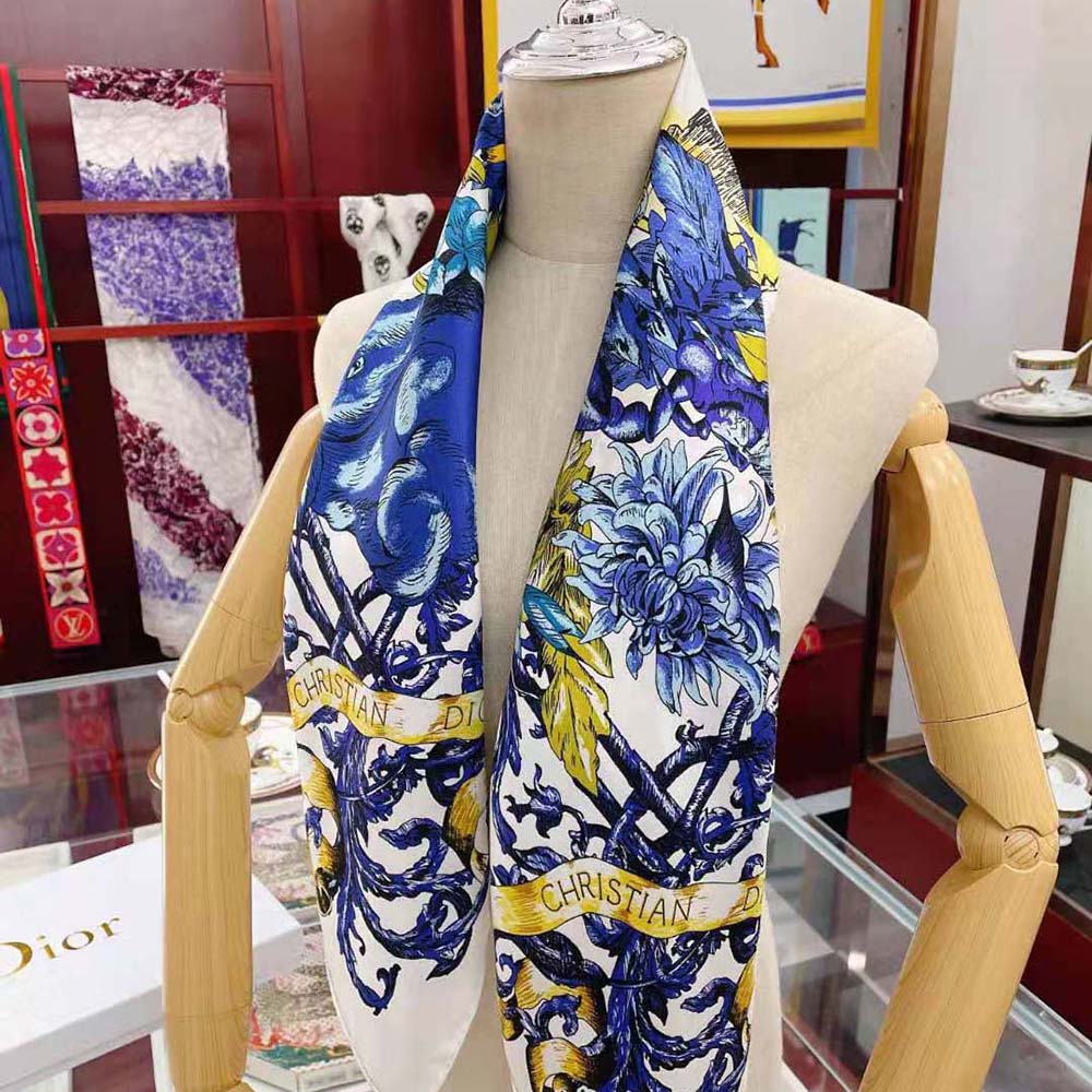Close-up of silk twill texture and Dior logo on scarf corner