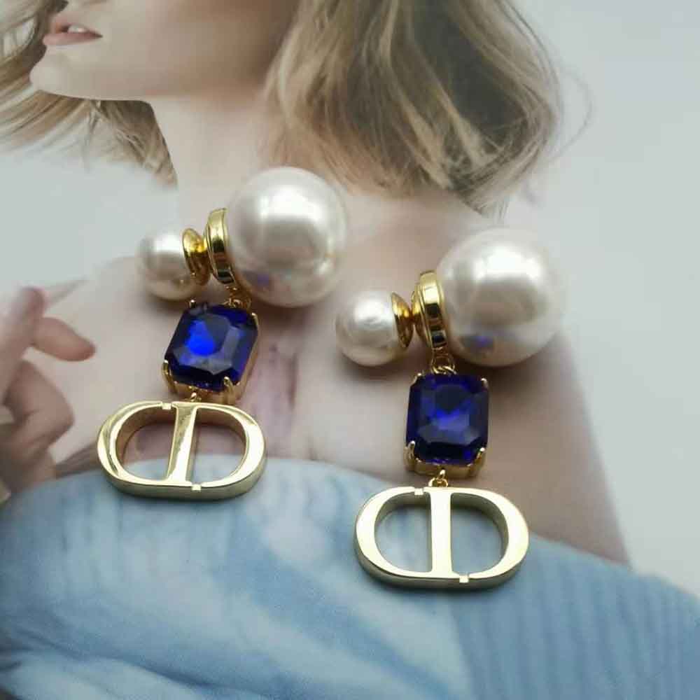 Dior Women Petit Cd Earrings displaying white resin pearls and blue accents