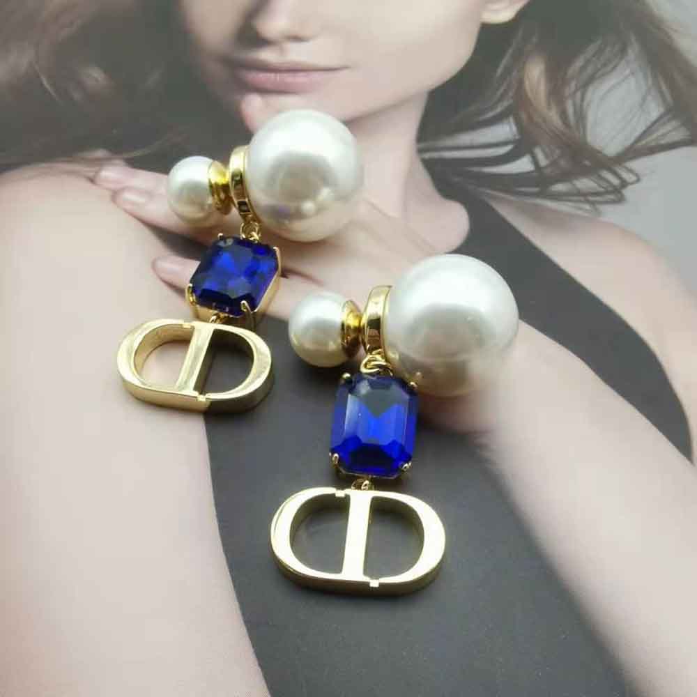 Side view of Dior Women Petit Cd Earrings showcasing push-back closure