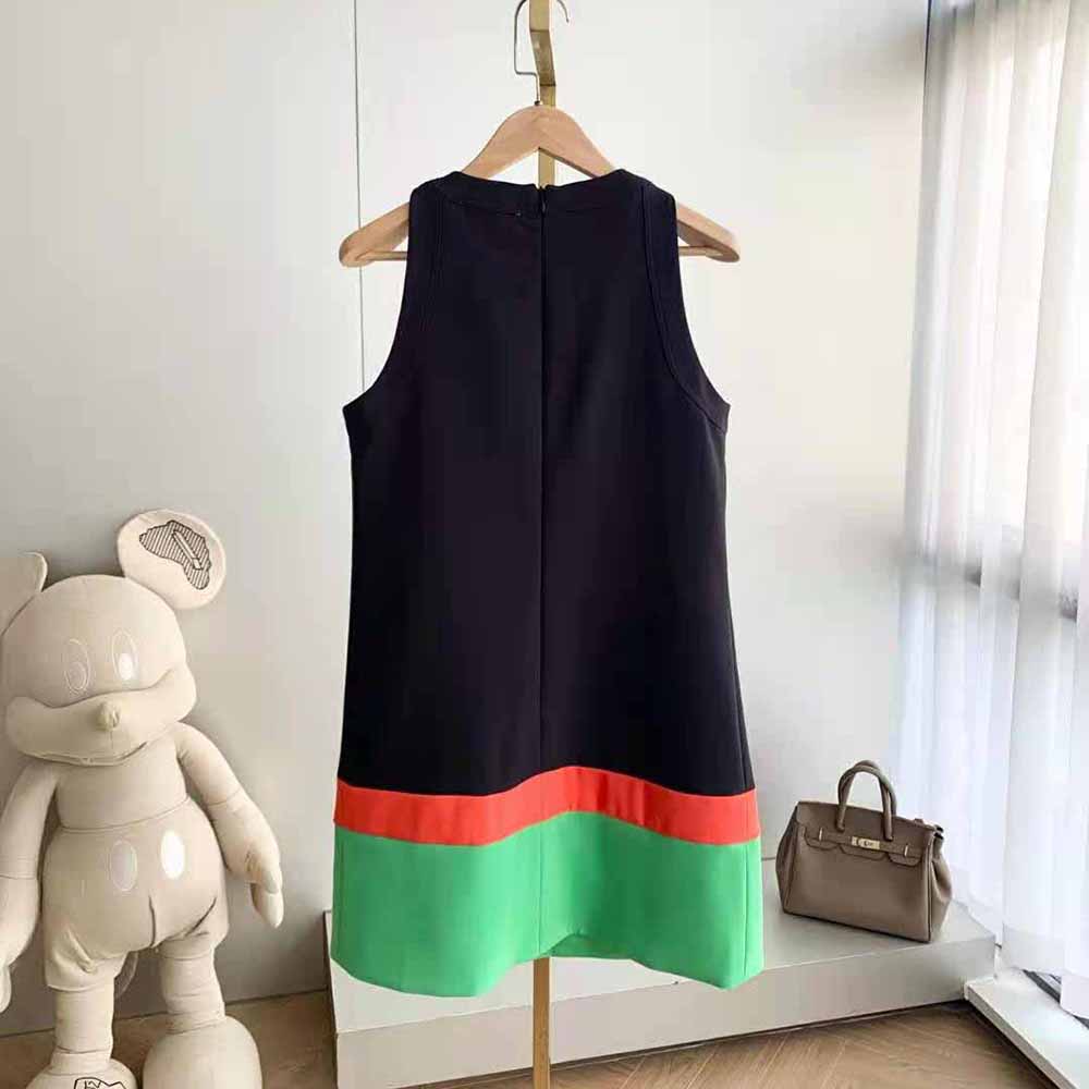 Side angle showcasing silhouette of Dior Women Short A-line Dress in black wool and silk
