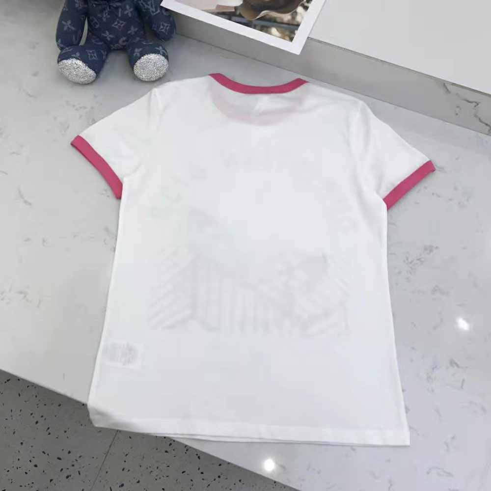 Side angle showing relaxed fit of Dior Women T-shirt in white cotton jersey