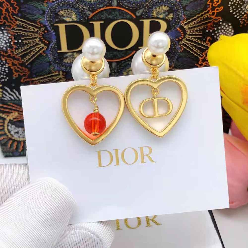 Close-up detail of red resin pearls on Dior Women Tribales Earrings
