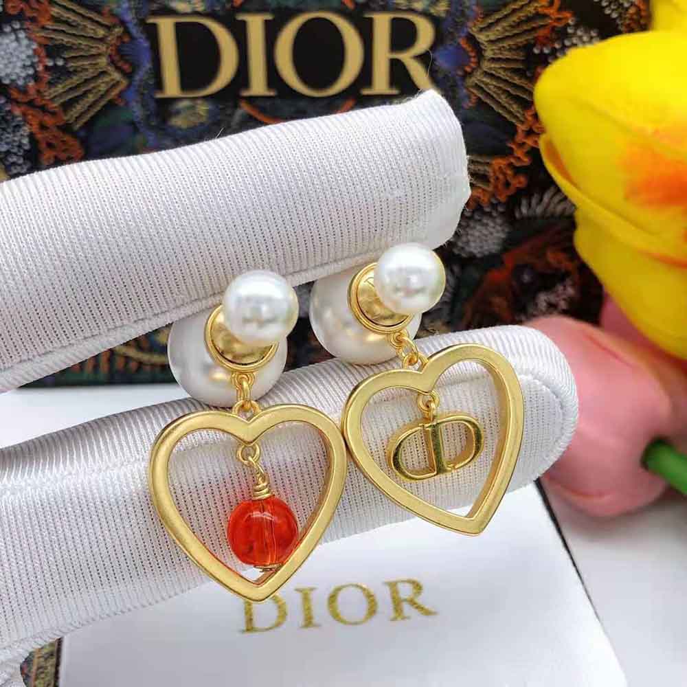 Side angle showing gold-finish metal and closure of Dior Women Tribales Earrings
