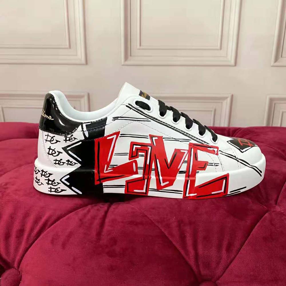 Overhead view showing lace-up closure and rubber sole of Dolce Gabbana D&G sneakers
