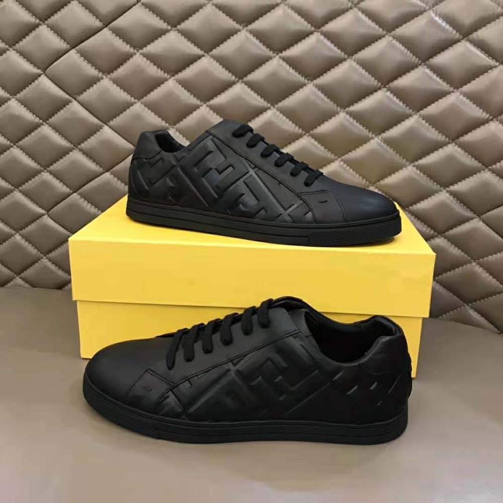 Top view showing black lace-up and sleek silhouette of Fendi low-tops