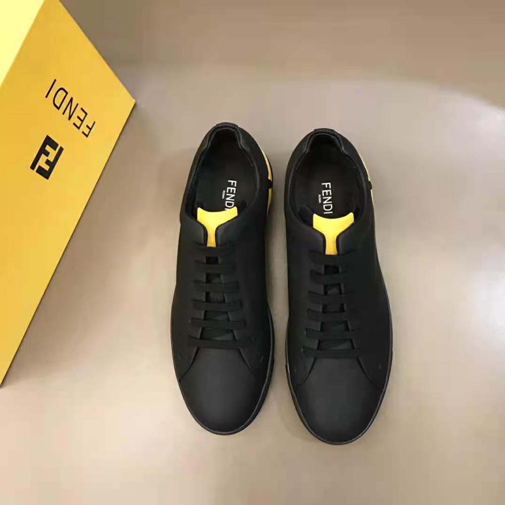 Close-up on black leather and rubber cupsole of Fendi Men Sneakers