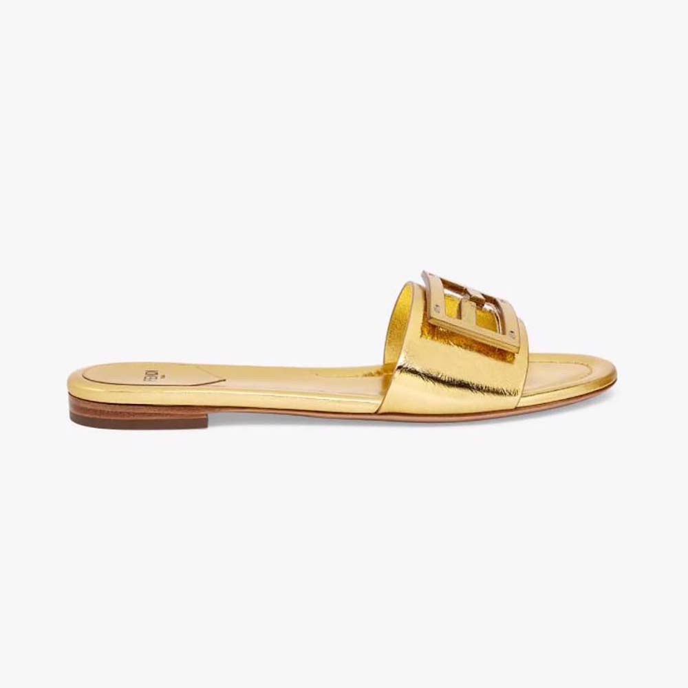Side view of Fendi Women Baguette Gold Nappa Leather Slides showing gold hardware