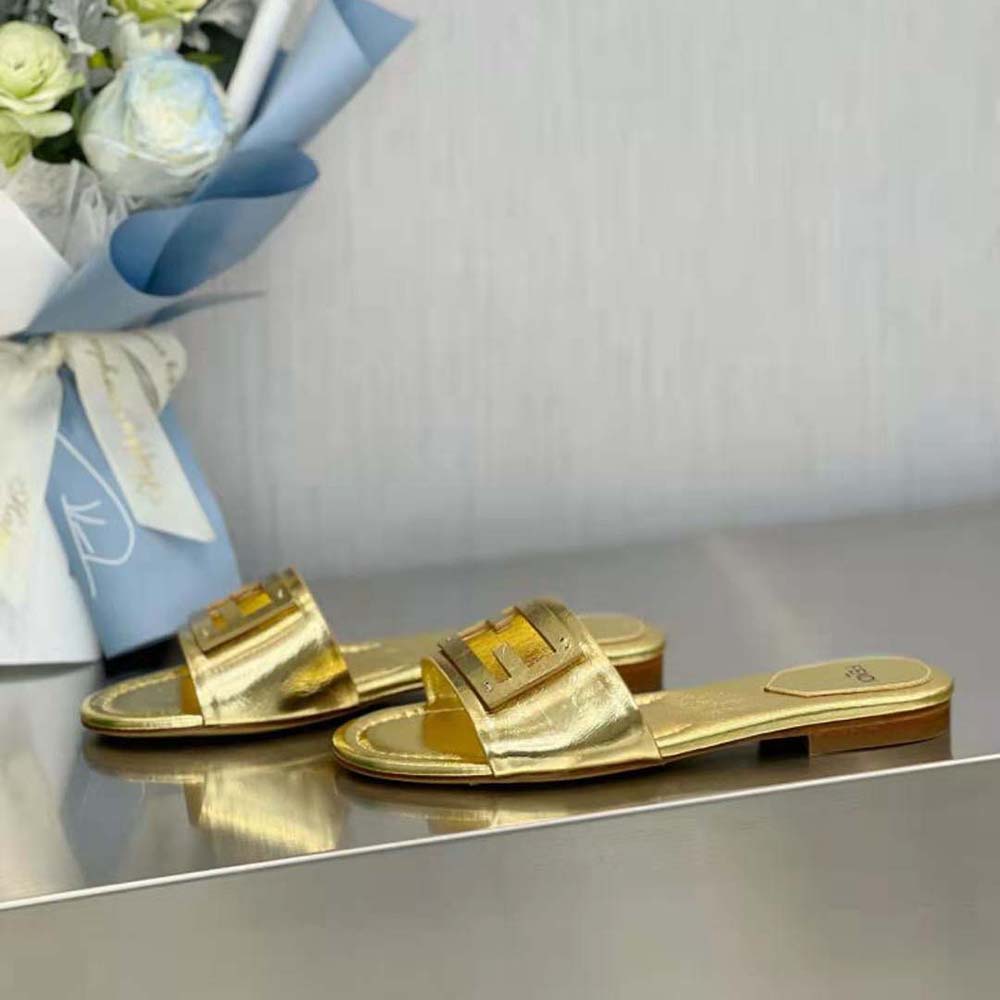 Top view of Fendi Women Baguette Gold Nappa Leather Slides highlighting open-toe design
