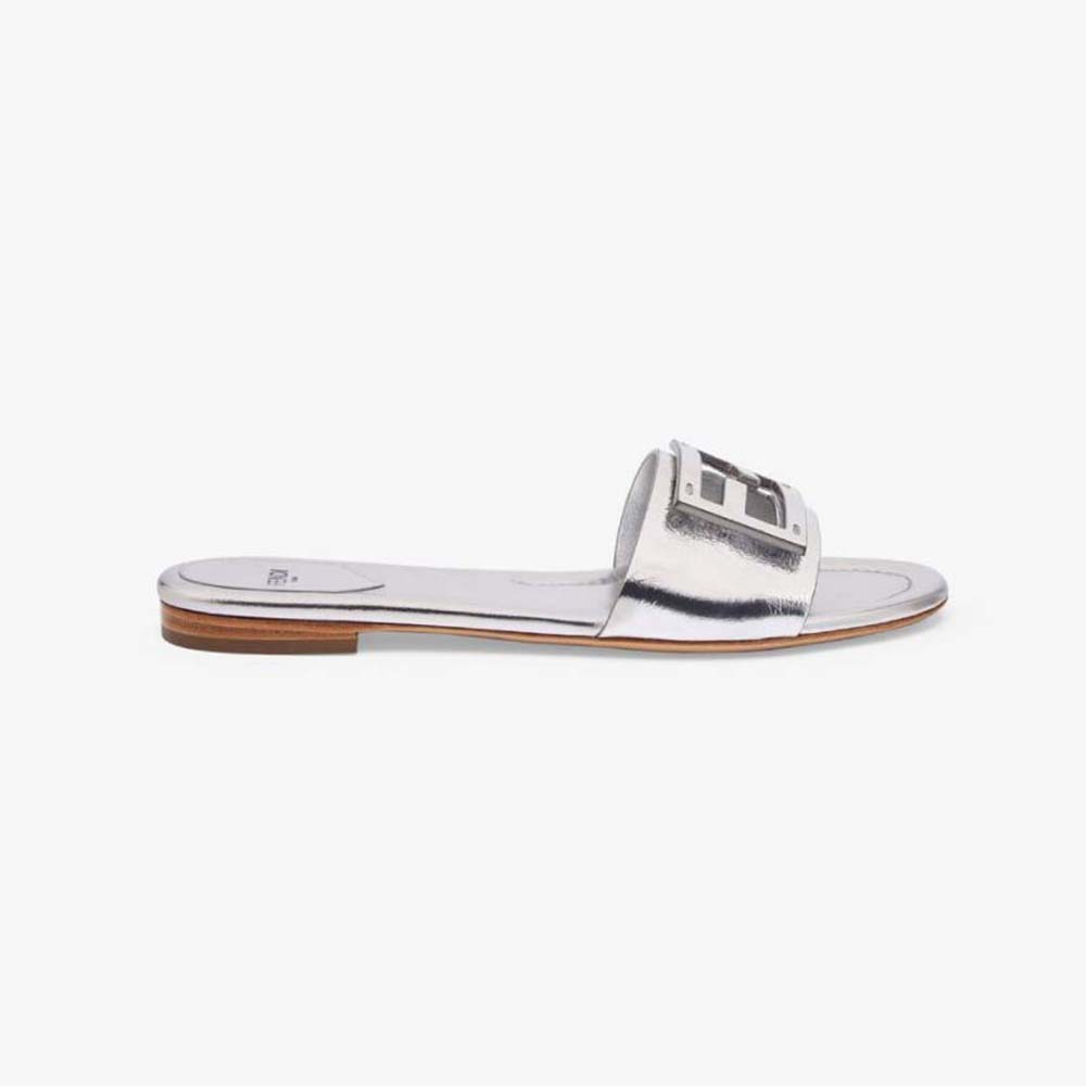 Side view of Fendi Women Baguette Silver Nappa Leather Slides showing silver sheen