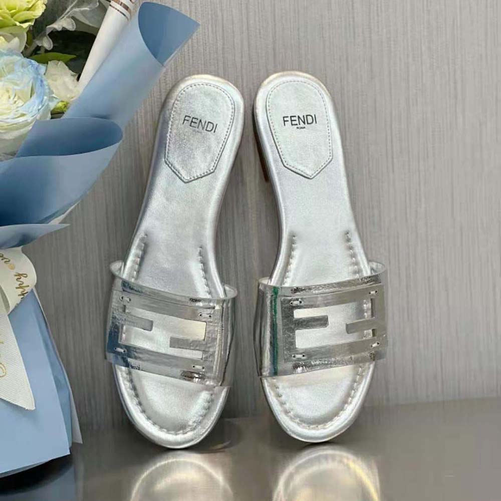 Close-up of silver hardware detail on Fendi Women Baguette Slides