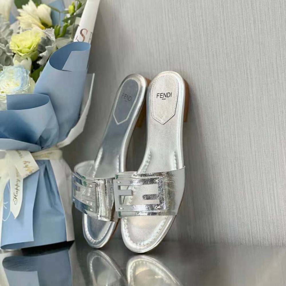 Top angle of Fendi Women Baguette Silver Nappa Leather Slides open-toe design