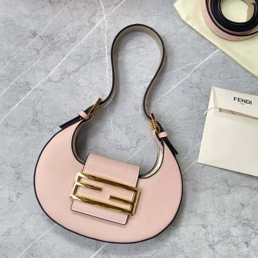 Close-up of gold-tone Fendi logo hardware on Cookie Pale Pink Mini Bag