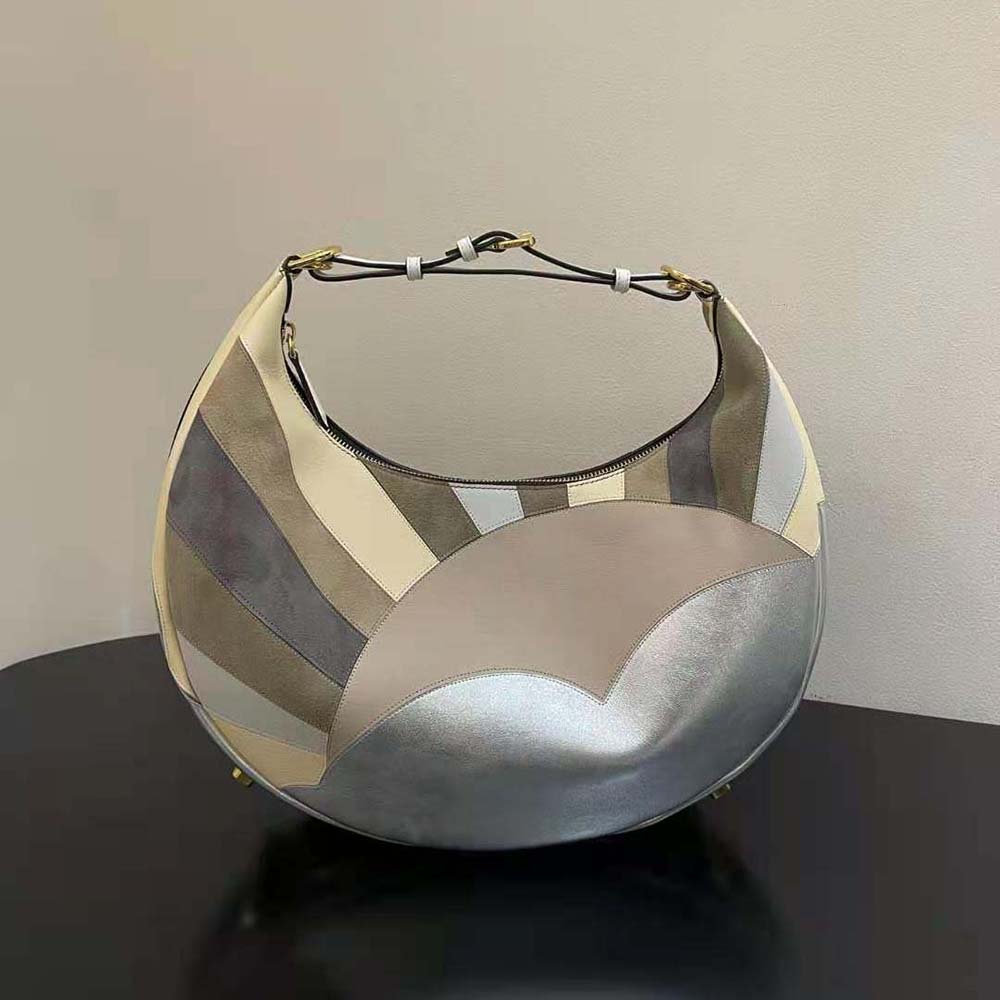 Close-up of gold hardware and embossed logo on Fendi Women Fendigraphy bag