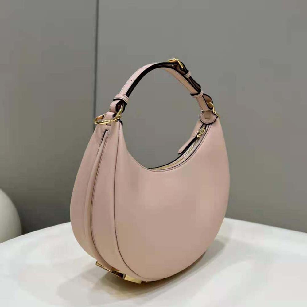 Side angle showing flap closure on Fendi Women Fendigraphy Small Pink Bag
