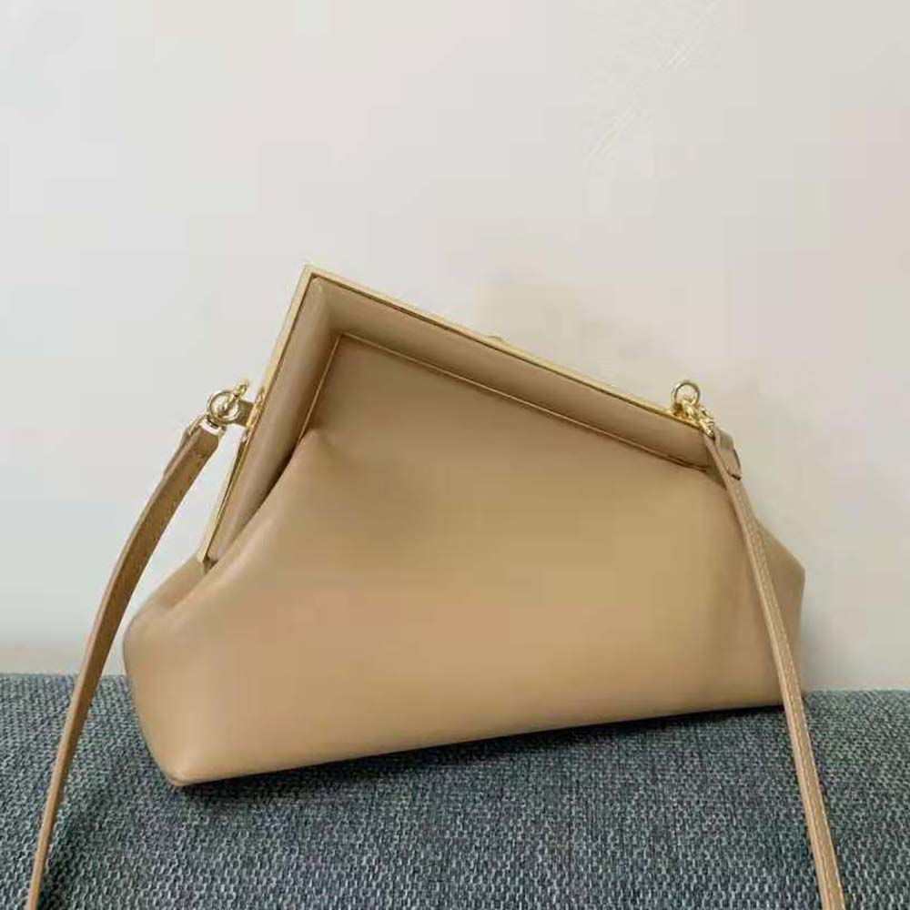 Side angle showing structure of Fendi Women First Small Beige Leather Bag