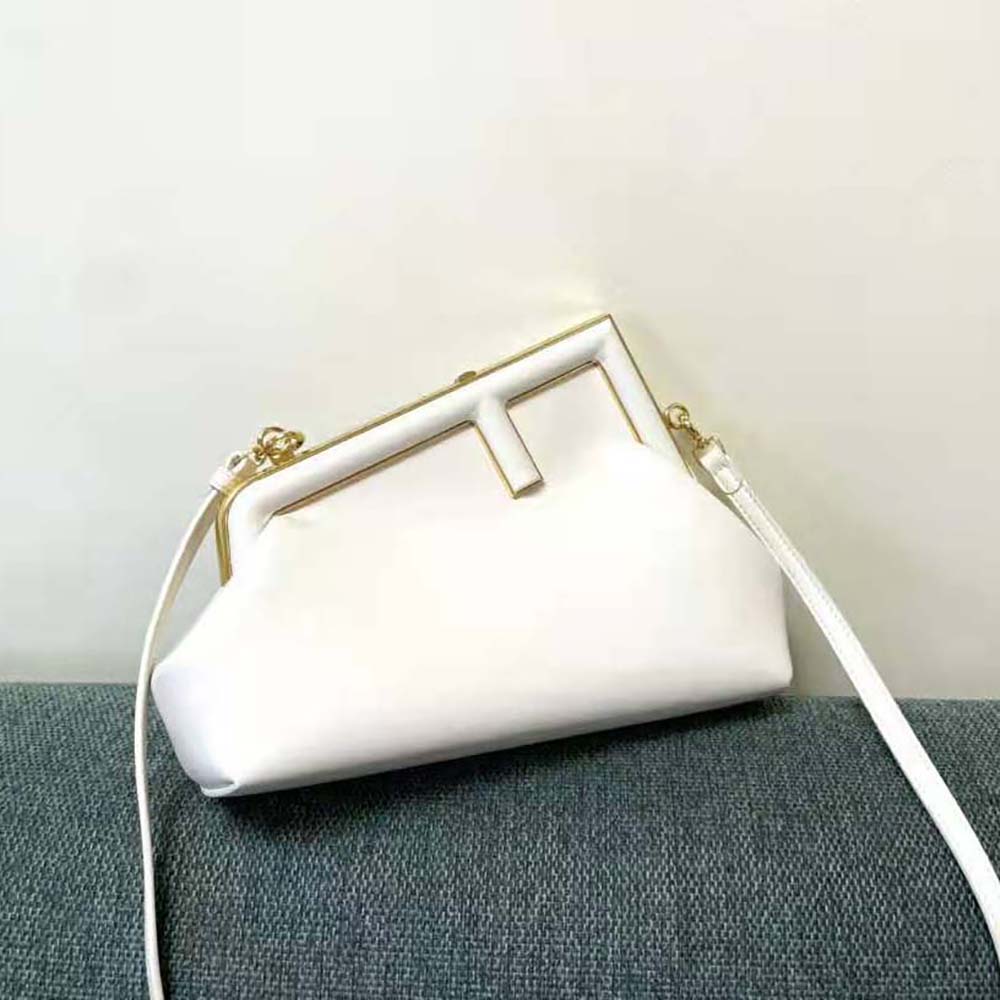 Close-up of gold hardware detail on Fendi Women First Small White Leather Bag