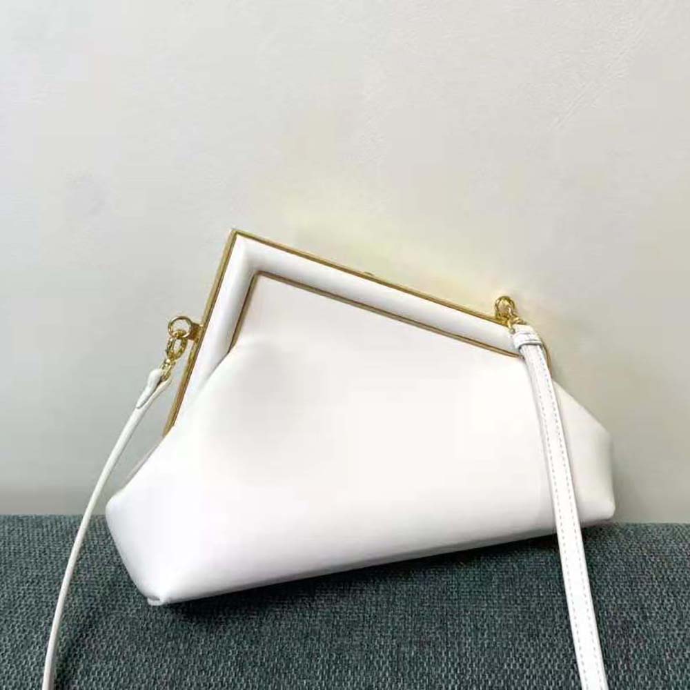 Side angle showing compact silhouette of Fendi Women First Small White Leather Bag