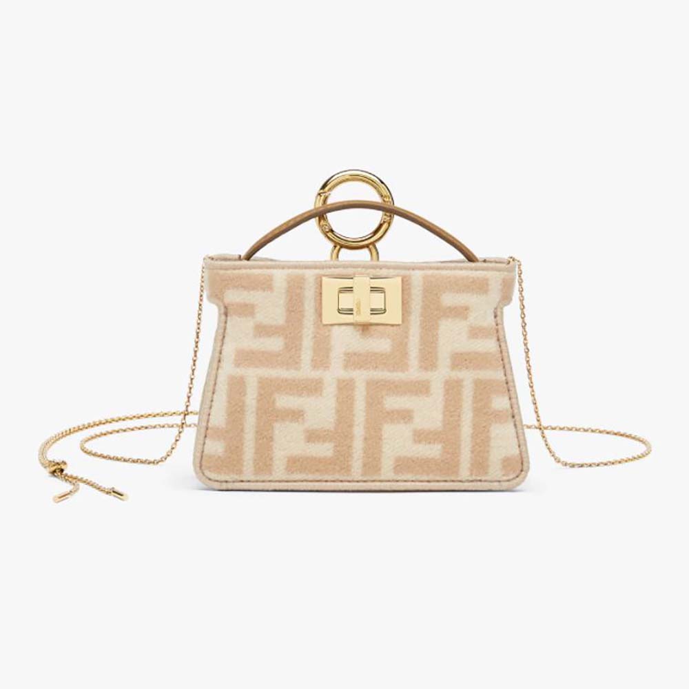 Front view of Fendi Women Nano Peekaboo Charm Beige Wool Charm-Pink bag