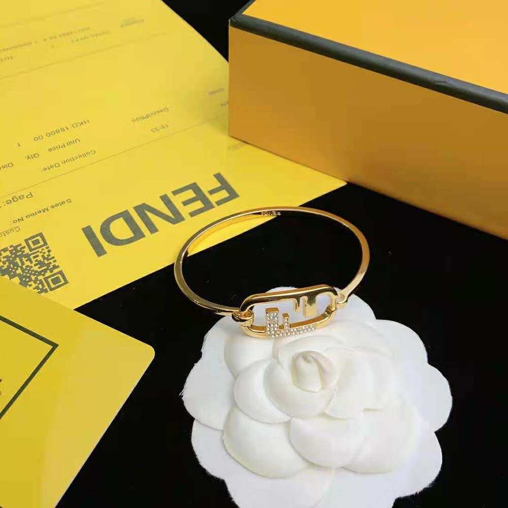 Fendi Women O Lock Bracelet Gold-Colored Bracelet displayed on wrist