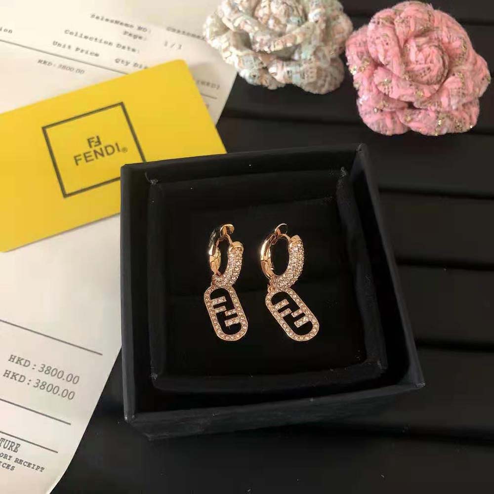 Side view showing silhouette and closure of Fendi Women O Lock Earrings