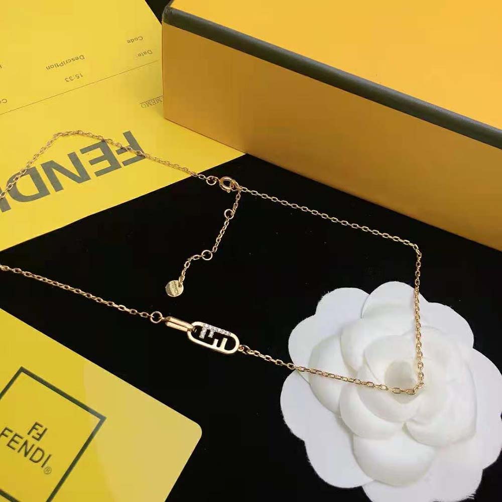 Side angle showing chain and lobster clasp on Fendi O Lock Necklace