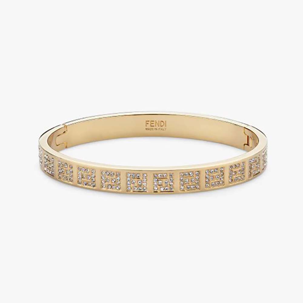 Close-up of Fendi Women Stiff Narrow-Band FF Bracelet Gold-colored clasp detail