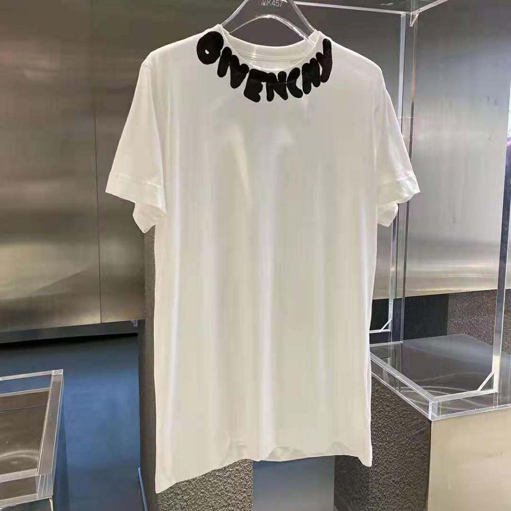 Side profile showcasing oversized fit on Givenchy Men T-shirt with prints